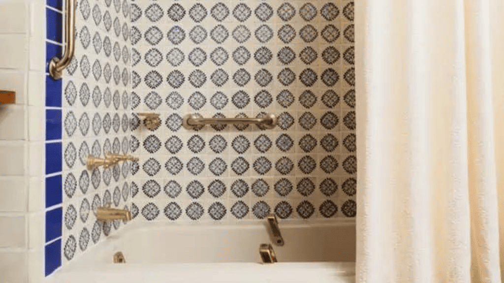 blue and white tile in acequia king bathtub