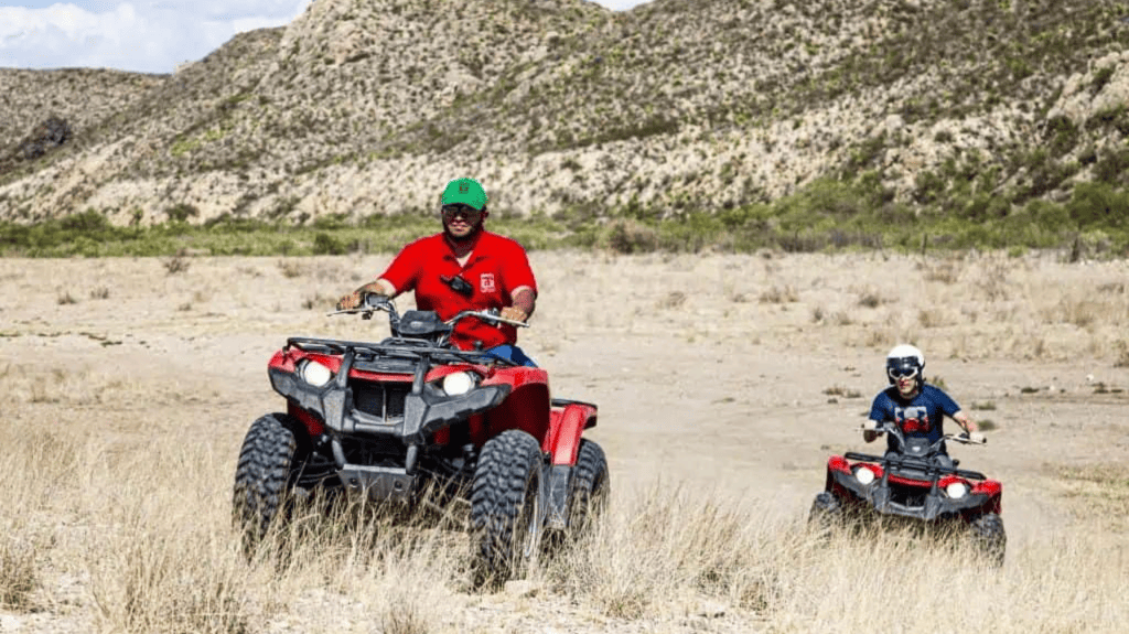 ATV rides through foothills
