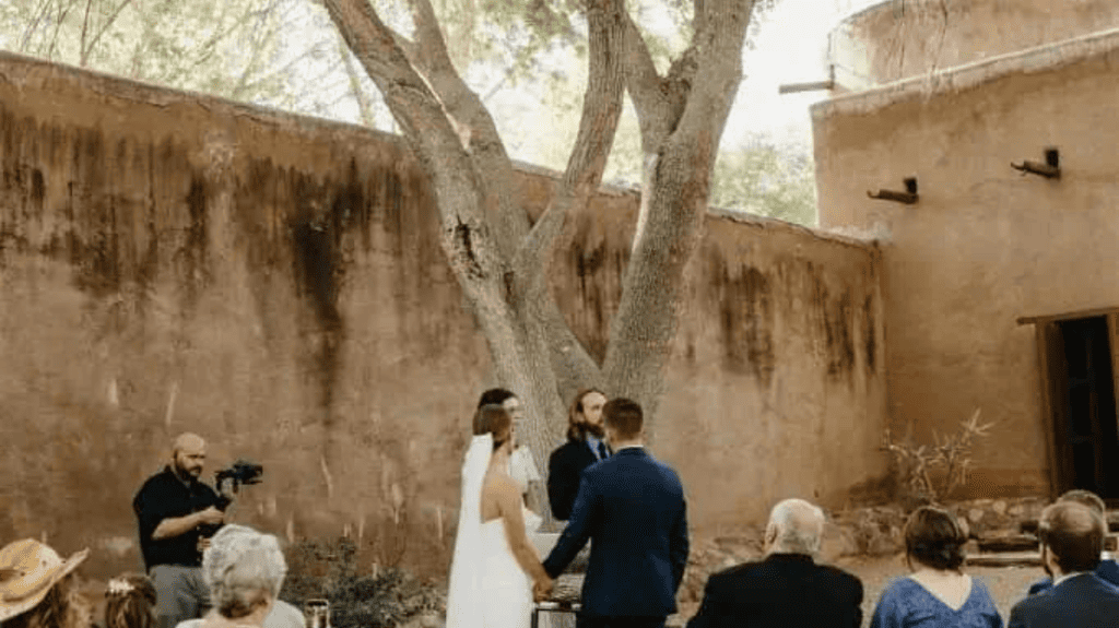 Cibolo fort courtyard wedding ceremony under tree