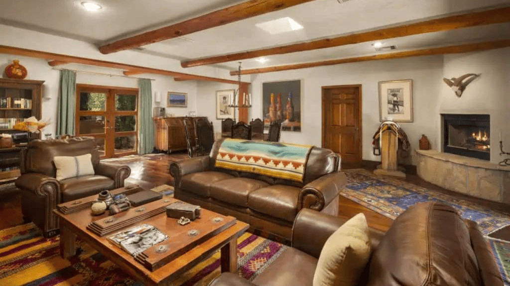 Owner's residence accommodation with fireplace and living room seating