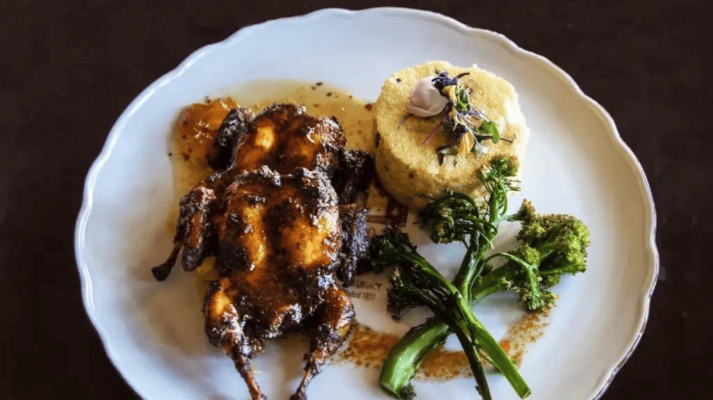 baked quail with broccolini Cibolo Creek Ranch