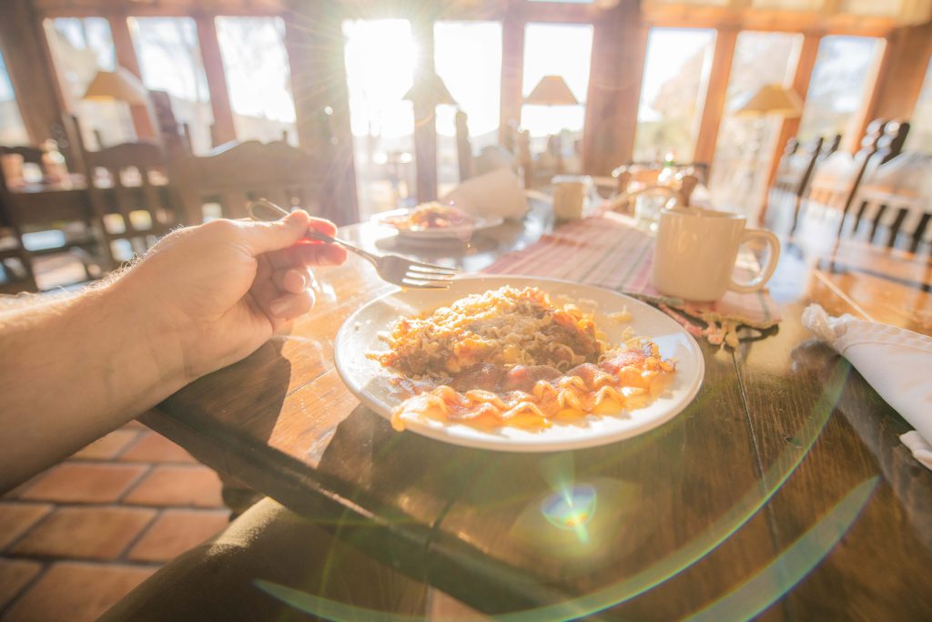 In-house guest enjoying a hearty breakfast at Cibolo Creek Ranch.